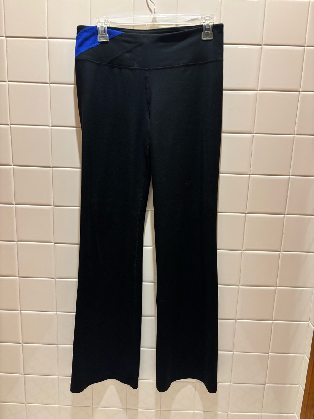 Under Armour Black Flare Yoga Pants with Blue Waist Accent